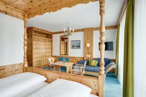 Postel nebo postele na pokoji v ubytování Hotel Mayer