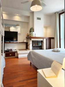 Ένα ή περισσότερα κρεβάτια σε δωμάτιο στο Holihome - Le Magnolie