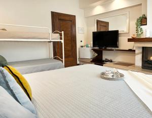 Ένα ή περισσότερα κρεβάτια σε δωμάτιο στο Holihome - Le Magnolie