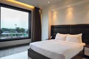 Postel nebo postele na pokoji v ubytování ECONEST HOTEL + 37 fotografií