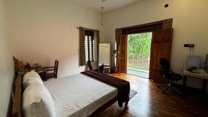 Bilde i galleriet til Nights & Rains - the ultimate quiet getaway i Trivandrum