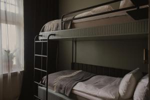 Postel nebo postele na pokoji v ubytování Home Hotel Christian IV