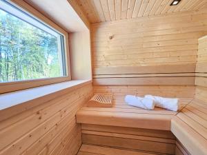 Φωτογραφία από το άλμπουμ του Lychenseevilla mit Seeblick, Wintergarten, Kamin und Sauna σε Lychen