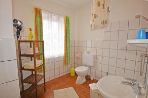 Koupelna v ubytování Appartment Vermietung Lütje + 37 fotografií