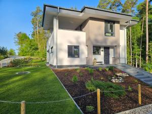 Κήπος έξω από το Lychenseevilla mit Seeblick, Wintergarten, Kamin und Sauna