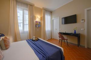 TV a/nebo společenská místnost v ubytování La Corticina - Rooms & Suite - Firenze