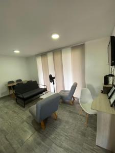 TV a/nebo společenská místnost v ubytování Entire home in business luxury chipichape
