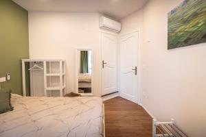 Postel nebo postele na pokoji v ubytování B&B San Gabriele