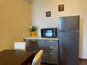 Kuchyň nebo kuchyňský kout v ubytování Grand Pool Apartment Ika-Opatija