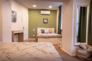Postel nebo postele na pokoji v ubytování B&B San Gabriele