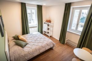 Postel nebo postele na pokoji v ubytování B&B San Gabriele