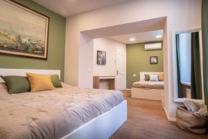 Postel nebo postele na pokoji v ubytování B&B San Gabriele + 37 fotografií