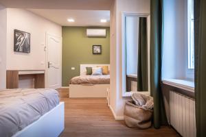 Postel nebo postele na pokoji v ubytování B&B San Gabriele