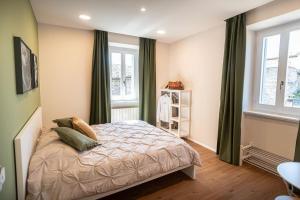 Postel nebo postele na pokoji v ubytování B&B San Gabriele