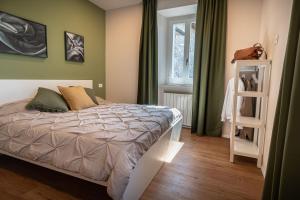 Postel nebo postele na pokoji v ubytování B&B San Gabriele