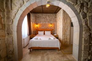 A bed or beds in a room at hotels crazy horse