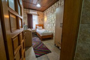 A bed or beds in a room at hotels crazy horse