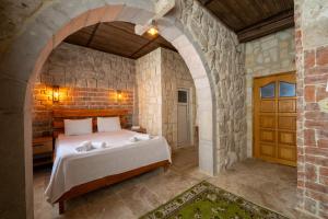 A bed or beds in a room at hotels crazy horse
