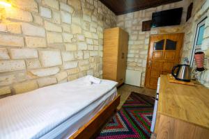A bed or beds in a room at hotels crazy horse