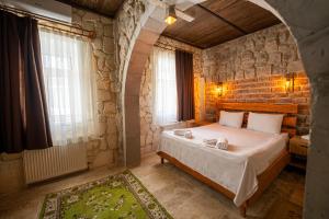 A bed or beds in a room at hotels crazy horse