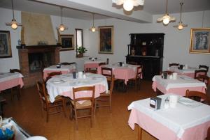 Restavracija oz. druge možnosti za prehrano v nastanitvi Albergo Alla Campana