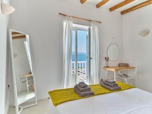 Voodi või voodid majutusasutuse ARIADNI Lux villa with 180 panoramic sea view toas