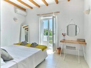 Voodi või voodid majutusasutuse ARIADNI Lux villa with 180 panoramic sea view toas