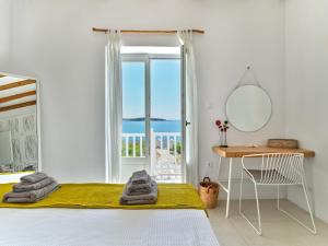 Voodi või voodid majutusasutuse ARIADNI Lux villa with 180 panoramic sea view toas