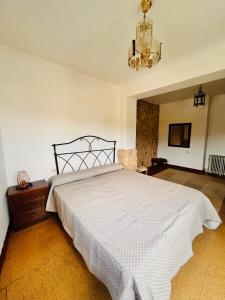Ένα ή περισσότερα κρεβάτια σε δωμάτιο στο Casa Camino e Mar +19 φωτογραφίες