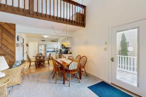 a kitchen and dining room with a table and chairs at Town of Bethany Beach --- 417 Lekites Ave in Bethany Beach