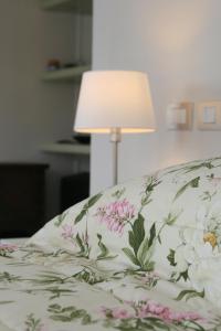 Posteľ alebo postele v izbe v ubytovaní Villa dei Fiori