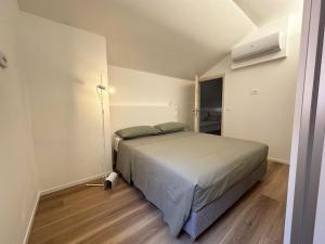 Ένα ή περισσότερα κρεβάτια σε δωμάτιο στο Residence Via Foscolo 65 Cattolica RN
