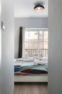 Postel nebo postele na pokoji v ubytování Modern Ensuite Rooms in Shared Apartment Near Balluta Bay Sliema Gzira