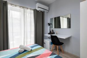 Postel nebo postele na pokoji v ubytování Modern Ensuite Rooms in Shared Apartment Near Balluta Bay Sliema Gzira