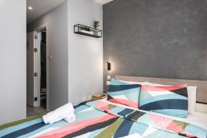Postel nebo postele na pokoji v ubytování Modern Ensuite Rooms in Shared Apartment Near Balluta Bay Sliema Gzira