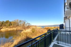 a view of a river from a balcony at Residenz am Balmer See - BS 55 mit Wellnessbereich in Balm