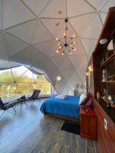 Posezení v ubytování El Gato Glamping con vista a prismas basálticos + 37 fotografií