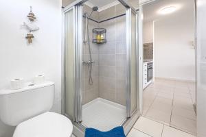 a bathroom with a shower and a toilet at Lolas in Puerto del Carmen +10 photos