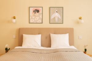 Posteľ alebo postele v izbe v ubytovaní Cocorico Apartments