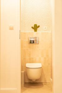 Kúpeľňa v ubytovaní Cocorico Apartments