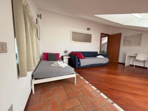 Posteľ alebo postele v izbe v ubytovaní Casa Vacanze Magnolia