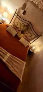 Postel nebo postele na pokoji v ubytování B&B il Nostro Sogno