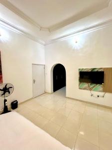 Ein Bett oder Betten in einem Zimmer der Unterkunft Tee-whyte private home