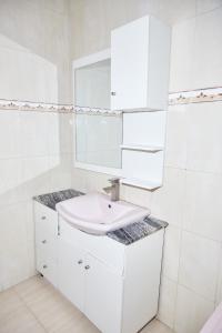 Koupelna v ubytování Tee-whyte private home