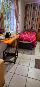 Postel nebo postele na pokoji v ubytování Keedols Inn & Backpackers
