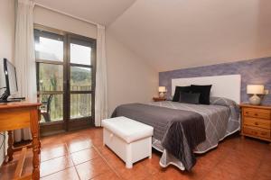 Katil atau katil-katil dalam bilik di Casa Rural Sofia Ordesa