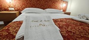 Letto o letti in una camera di Leoni di Sicilia