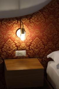 Letto o letti in una camera di Leoni di Sicilia