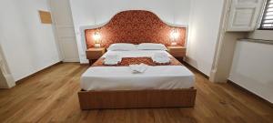 Letto o letti in una camera di Leoni di Sicilia