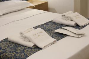 Letto o letti in una camera di Leoni di Sicilia